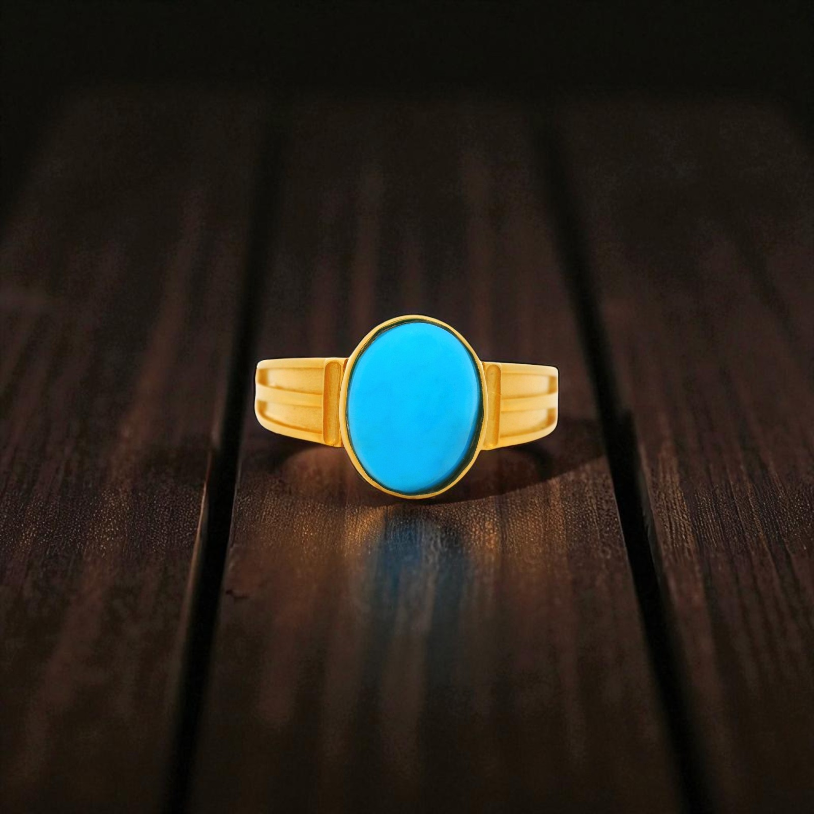 Gold Ring with Turquoise Oval Centre Stone