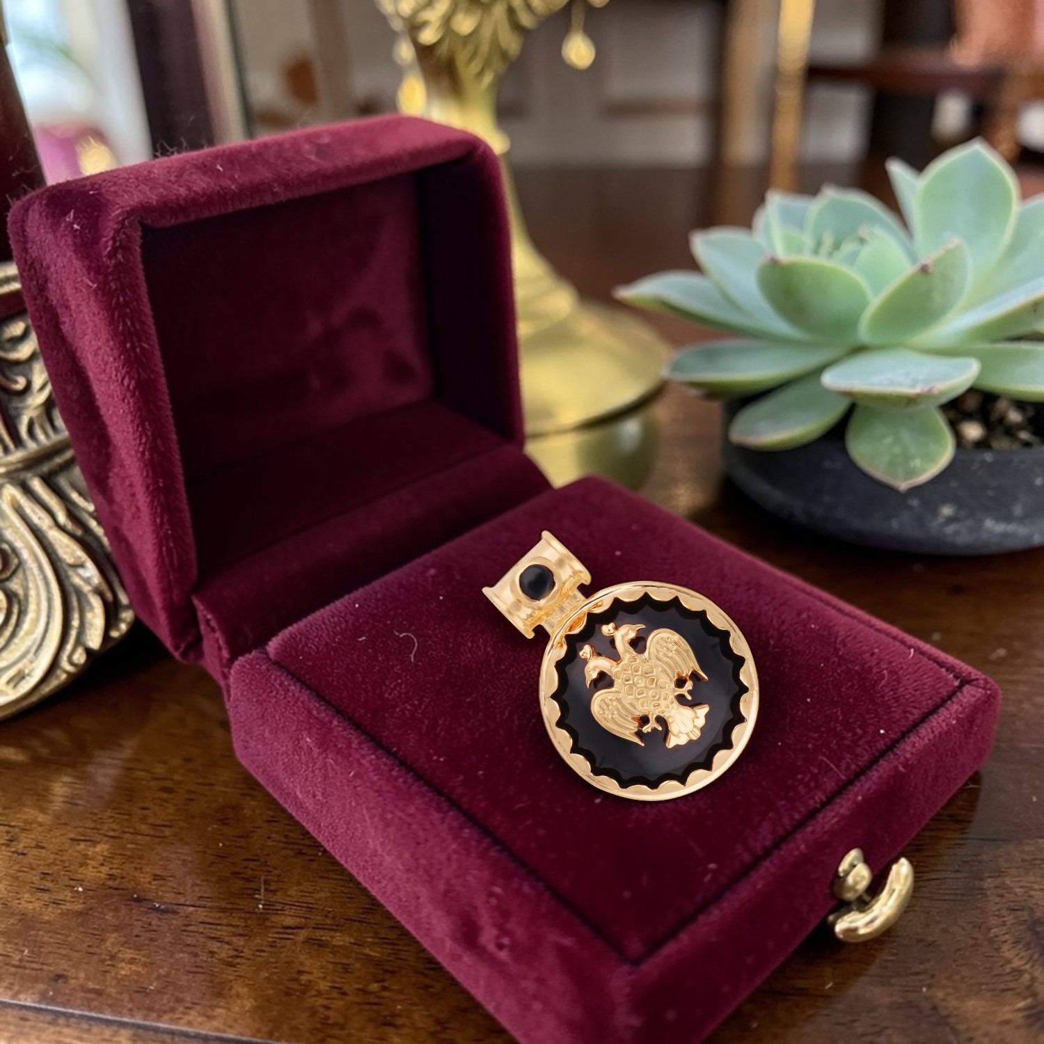 Gold Pendant with Black Onyx and Gandaberunda Motif Round Design