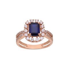 Sapphire Serenity: Rose Gold Ring with Single Blue Gem and Diamond Halo
