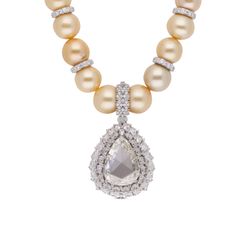 Timeless Charm: Solitaire Diamond Necklace with South Sea Pearl and Pink Sapphire