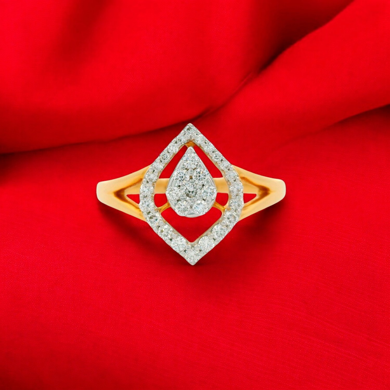 Elegant Gold Ring with Pear Cut Diamond Halo